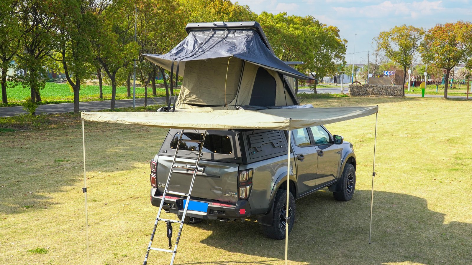 Shasta Shell Tough Top in camping setup with rooftop tent and awning